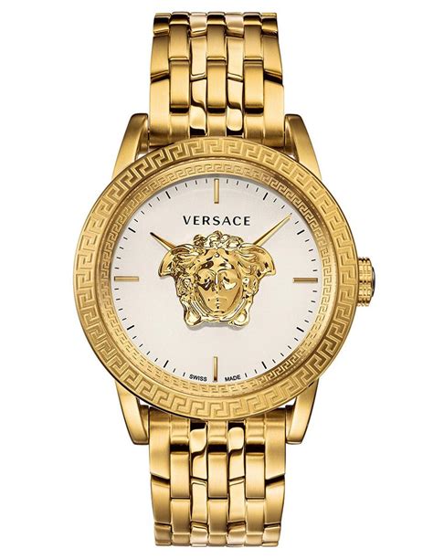 reloj dorado versace|Versace clock.